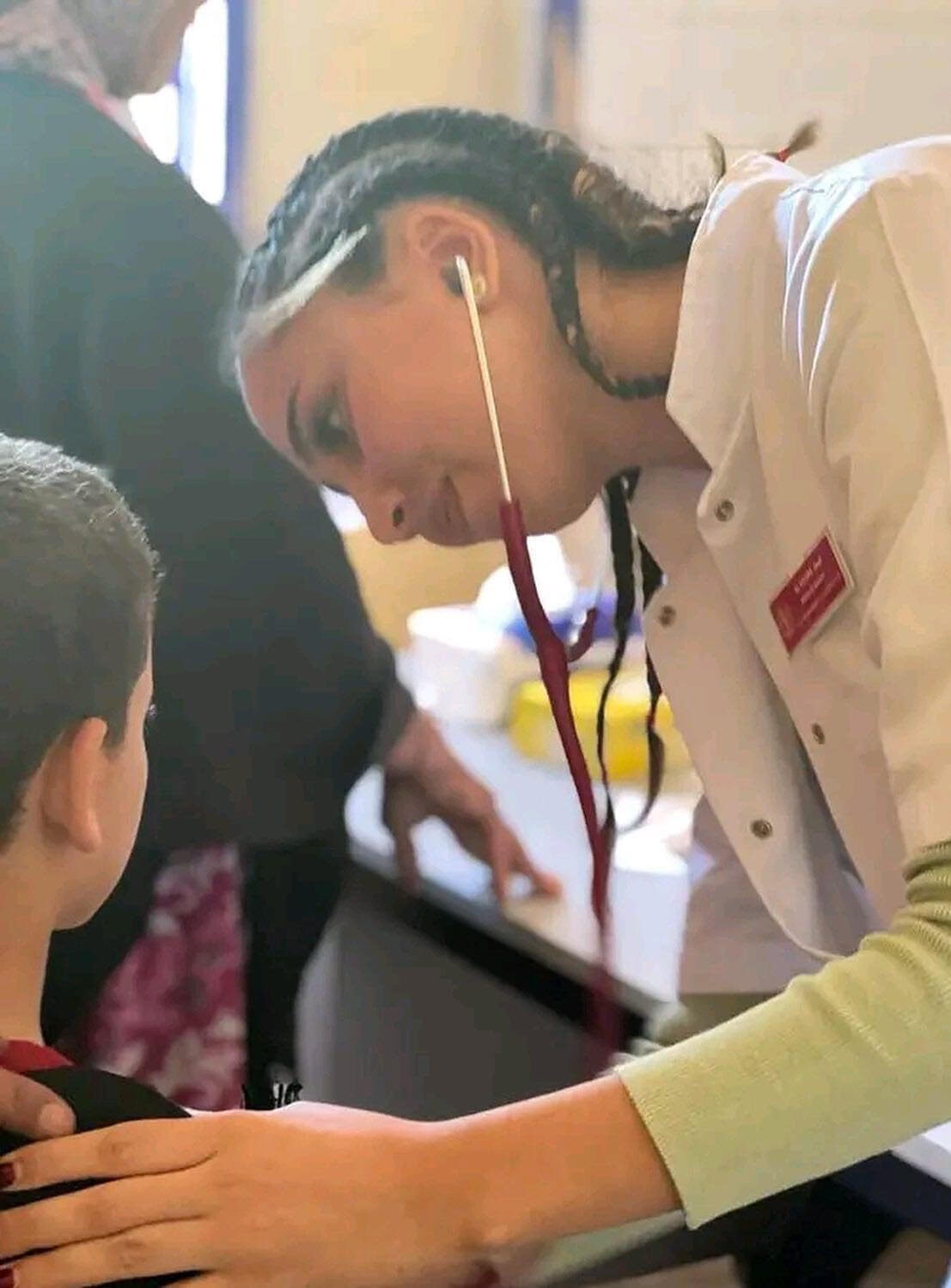 Medical professional examining